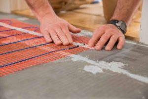 Underfloor Heating system, the Warmup StickyMat, which is designed to raise the floor level as little as possible.