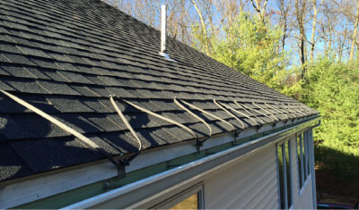 A roof with a Roof Deicing System instead of using Rock Salt to melt snow accumulation on the roof.