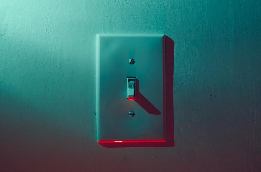 Outlet on the wall of an old house.