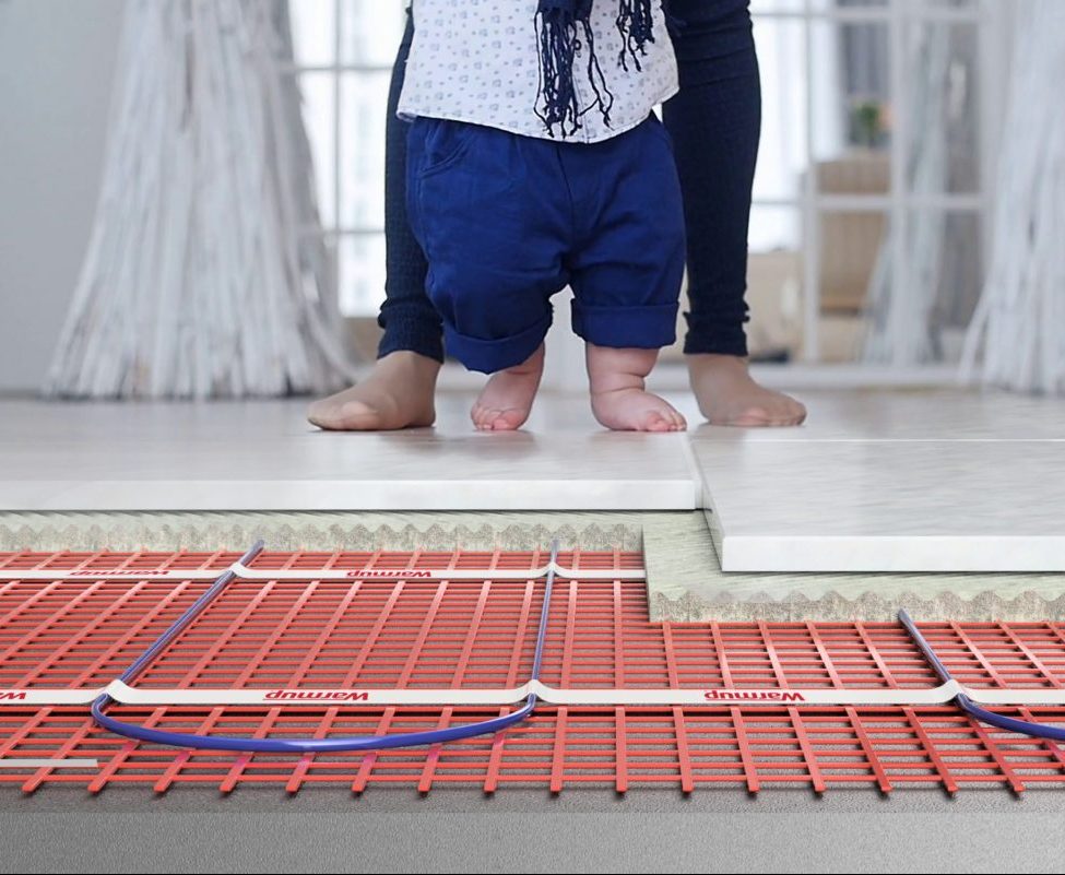 baby's feet on Sticky Mat underfloor heating