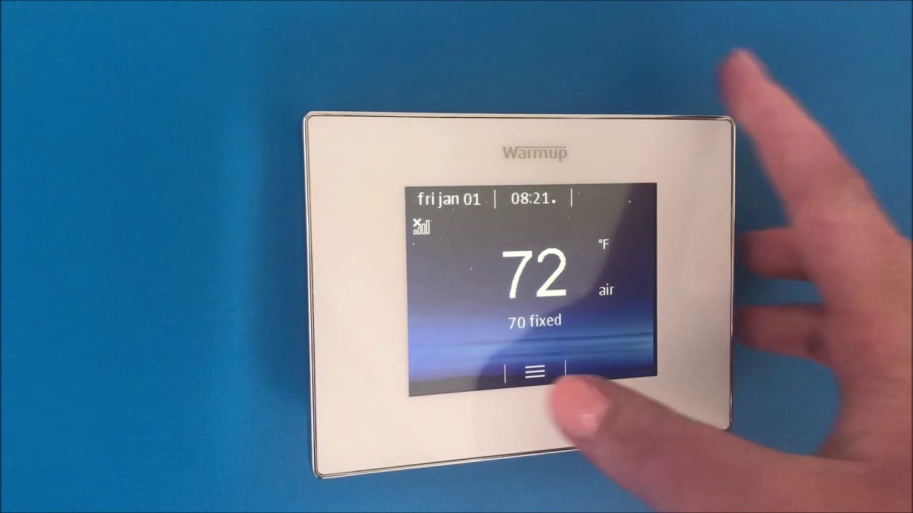 Smart Programmable Thermostat Installed on a Wall.