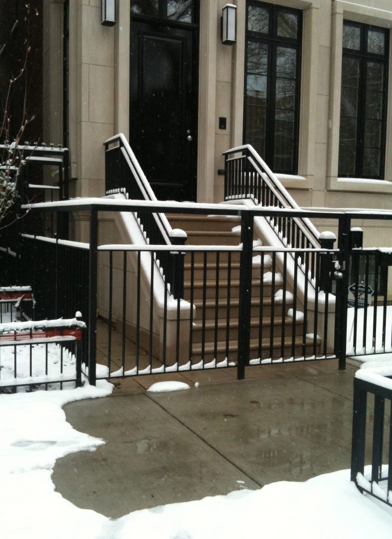 A townhouse with radiant heated stairs and sidewalk.