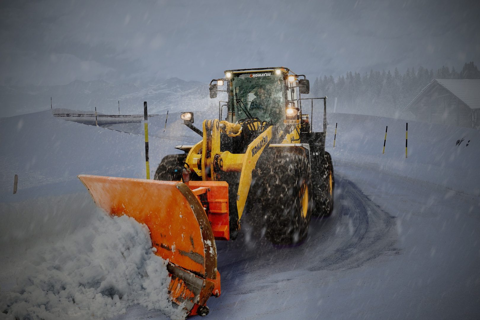 A snowplow removing snow.