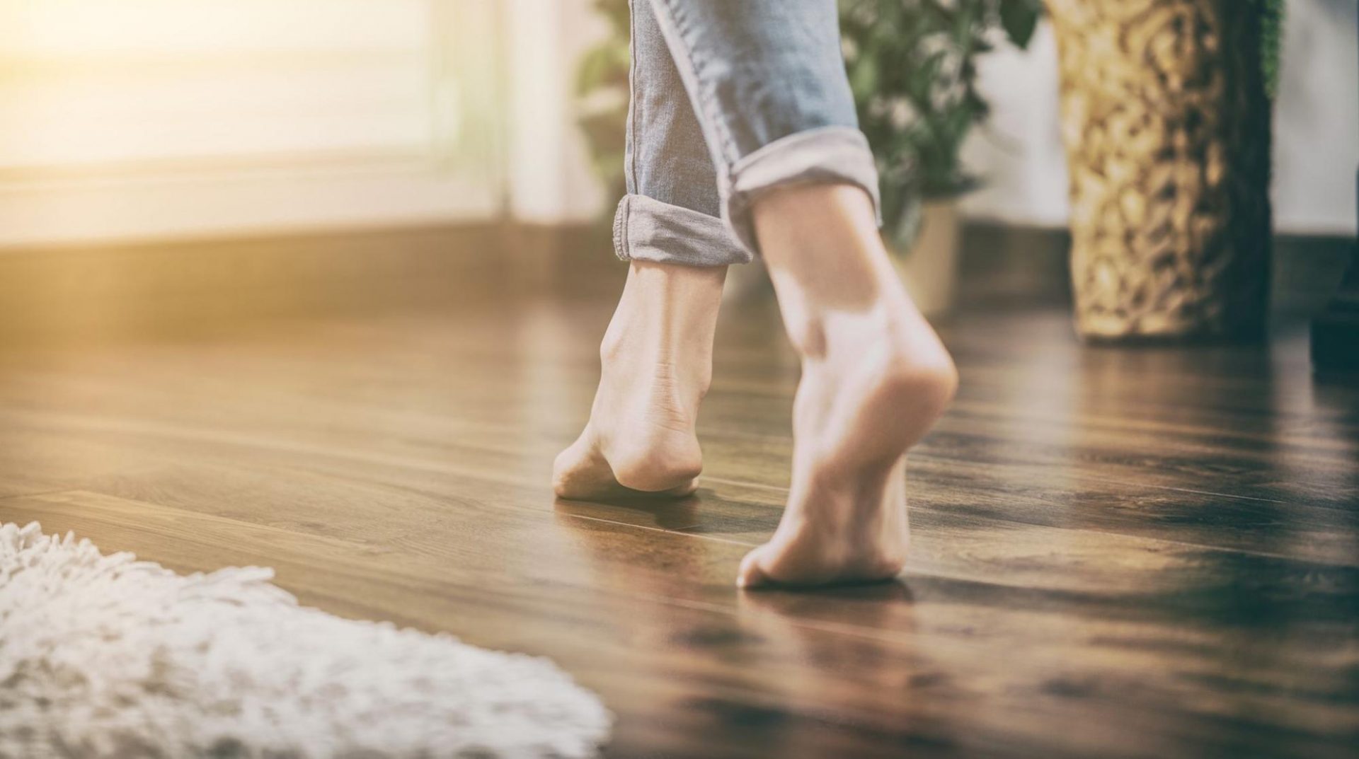 A person walking on a floor with radiant heat