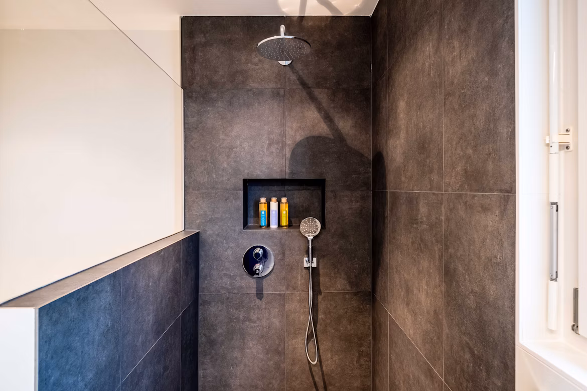 A shower with radiant underfloor heating.