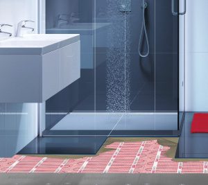 Electric radiant heat being installed in a bath and shower floor.