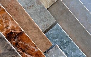 Floor heating can be installed over tile with acceptable deflection.