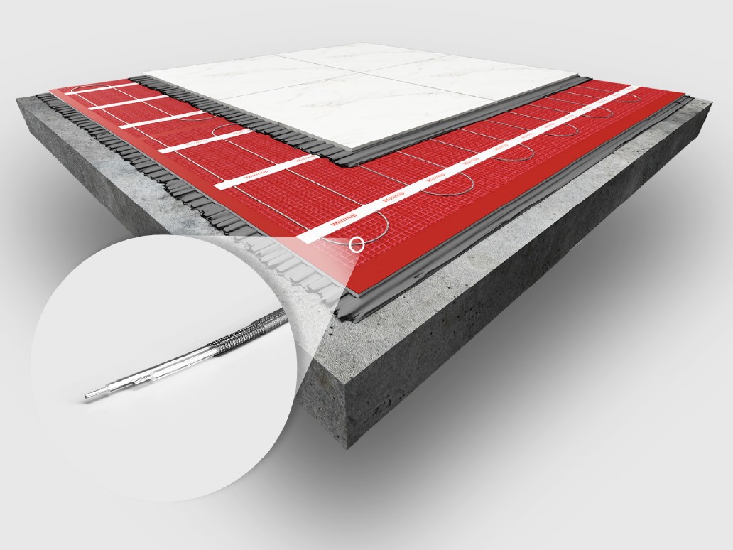 a cutaway image showing the thickness of the Warmup StickyMat when installed in the floor for underfloor heating
